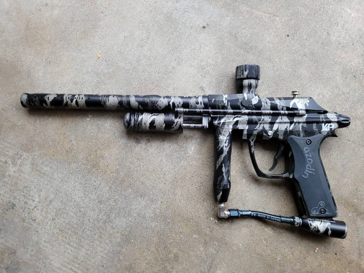 Azodin Kaos Pump paintball marker with a matching gray, urban camo annodizing