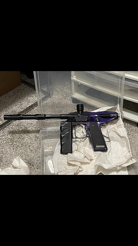 Click image for larger version

Name:	Purple X-mag.jpg
Views:	360
Size:	170.3 KB
ID:	713415