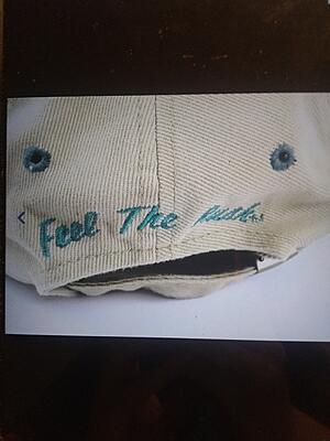 I think the back says feel the rush!Old tom berenger sniper quote ha.