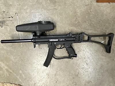 Pre-2011 Tippmann A-5 with egrip and Ops Gear stock