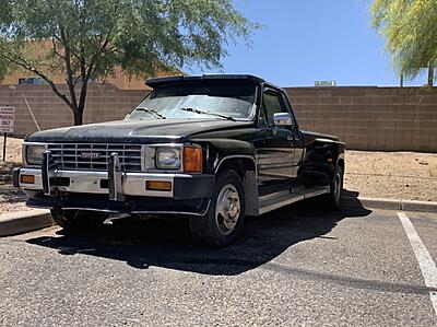 Period correct tow vehicle, 1986 Toyota one ton dually with custom dually bed.  Currently undergoing air ride conversion and om606 swap.