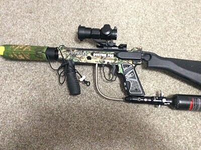 The cover keeps brush out of the gun and the rubber front grip is light years ahead of the plastic.